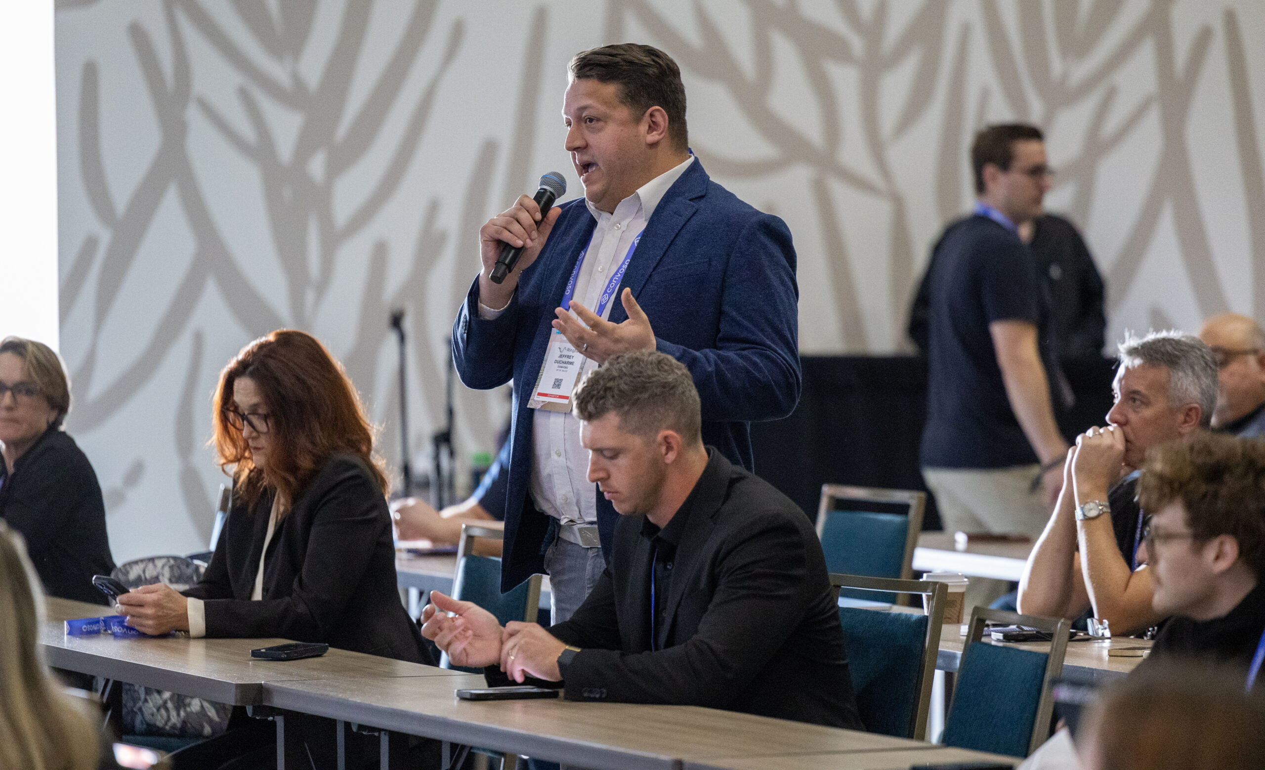An attendee speaking during a session at LGW 2026
